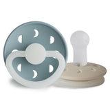 Pack de 2 Chupetas Noturnas em Silicone Moon Phase (Brilham no Escuro) - St Blue/Cream - FRIGG