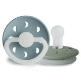 Pack de 2 Chupetas Noturnas em Silicone Moon Phase (Brilham no Escuro) - St Blue/Sage - FRIGG